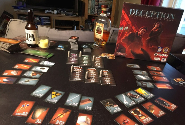 Picture of the gritty cards and bullet-themed markers of Deception